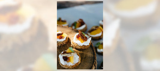 Canapé Navel Orange with Marmalade, Farmstead Cheese, Toast, Basil and Killer Pecans