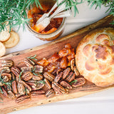 Rosemary Pecans 24 oz Rectangle Tin tied with Ribbon