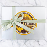 Rosemary Pecans 24 oz Rectangle Tin tied with Ribbon