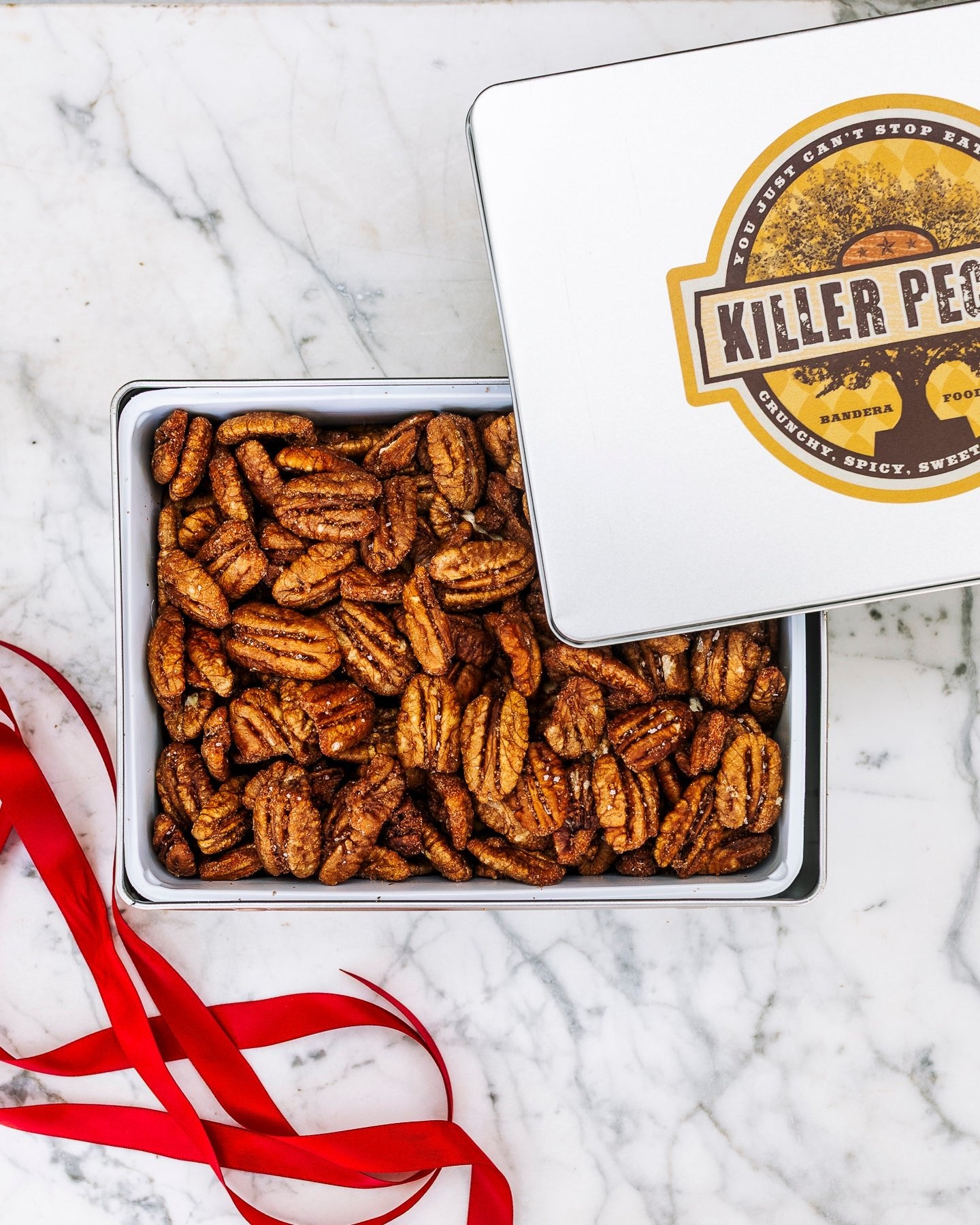 Cinnamon Pecans 24 oz Rectangle Tin tied with Ribbon - Killer Pecans