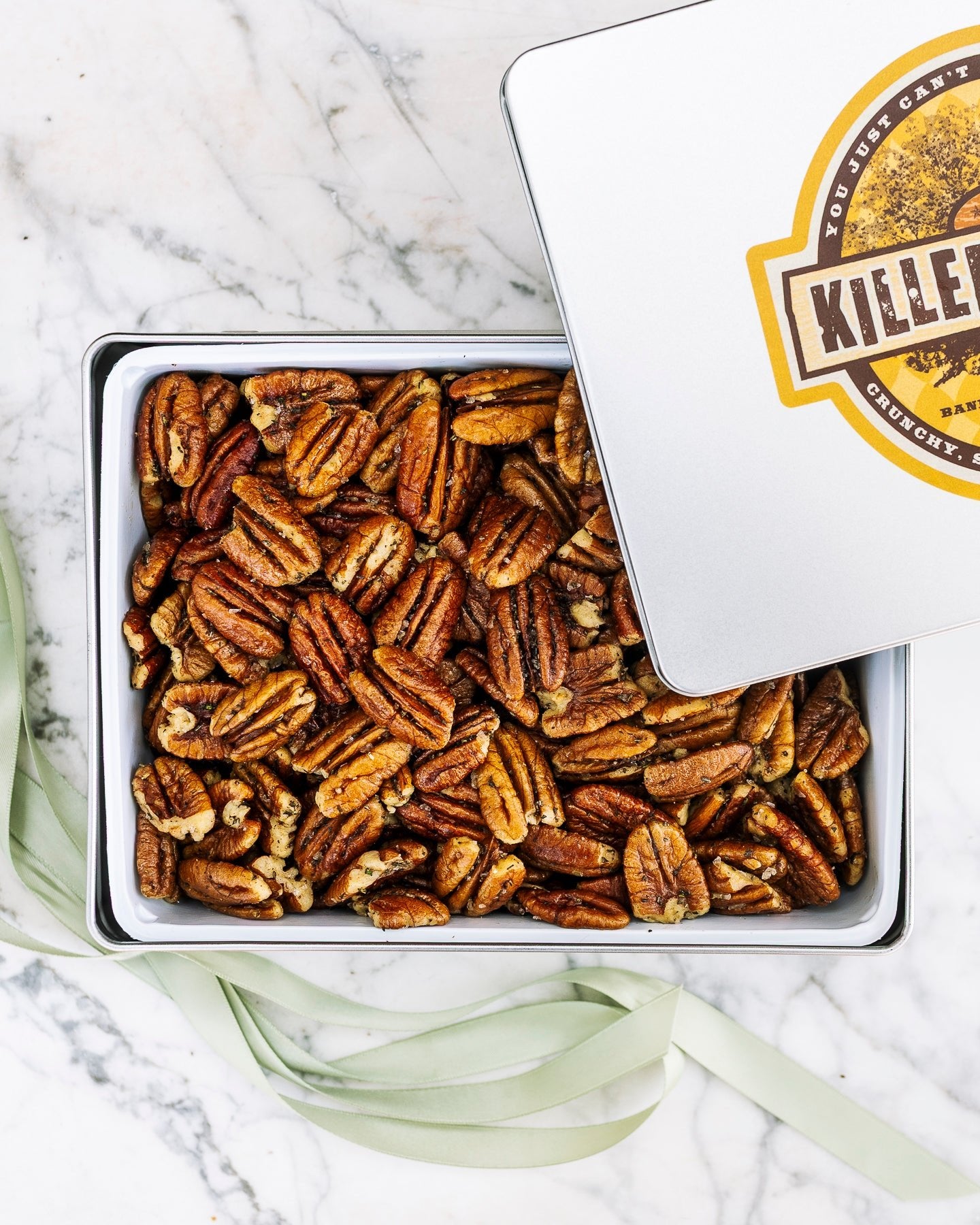 Rosemary Pecans 24 oz Rectangle Tin tied with Ribbon - Killer Pecans