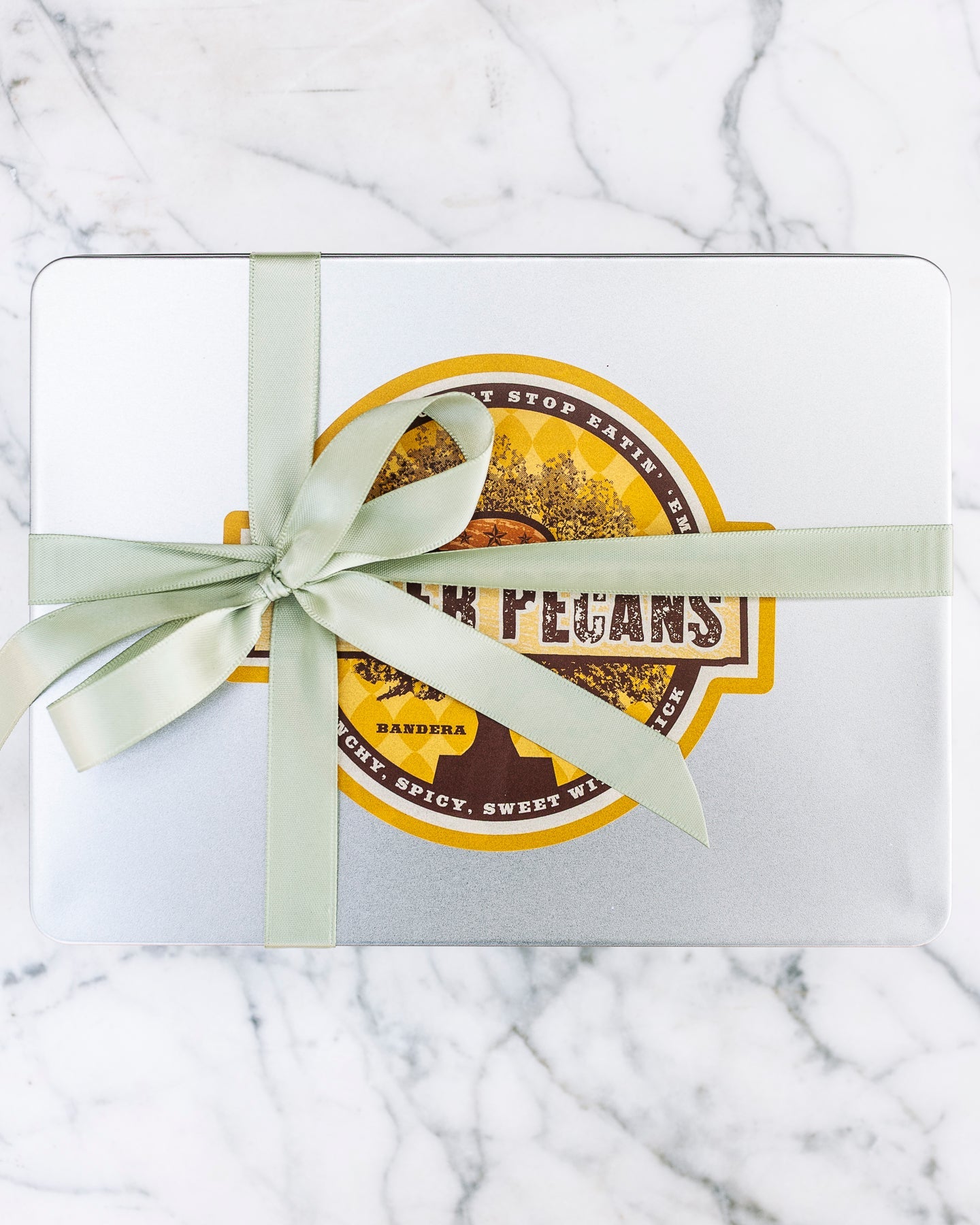 Rosemary Pecans 24 oz Rectangle Tin tied with Ribbon - Killer Pecans